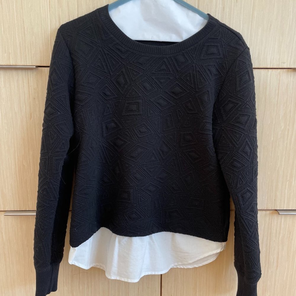 Sweatshirt with exposed shirting